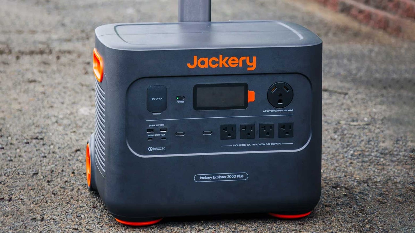 Jackery 2000 plus solar generator sitting on a paved driveway