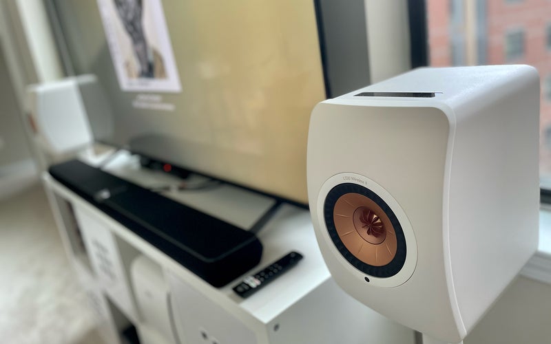 KEF LS50 Wireless II speakers flanking Tony's TV